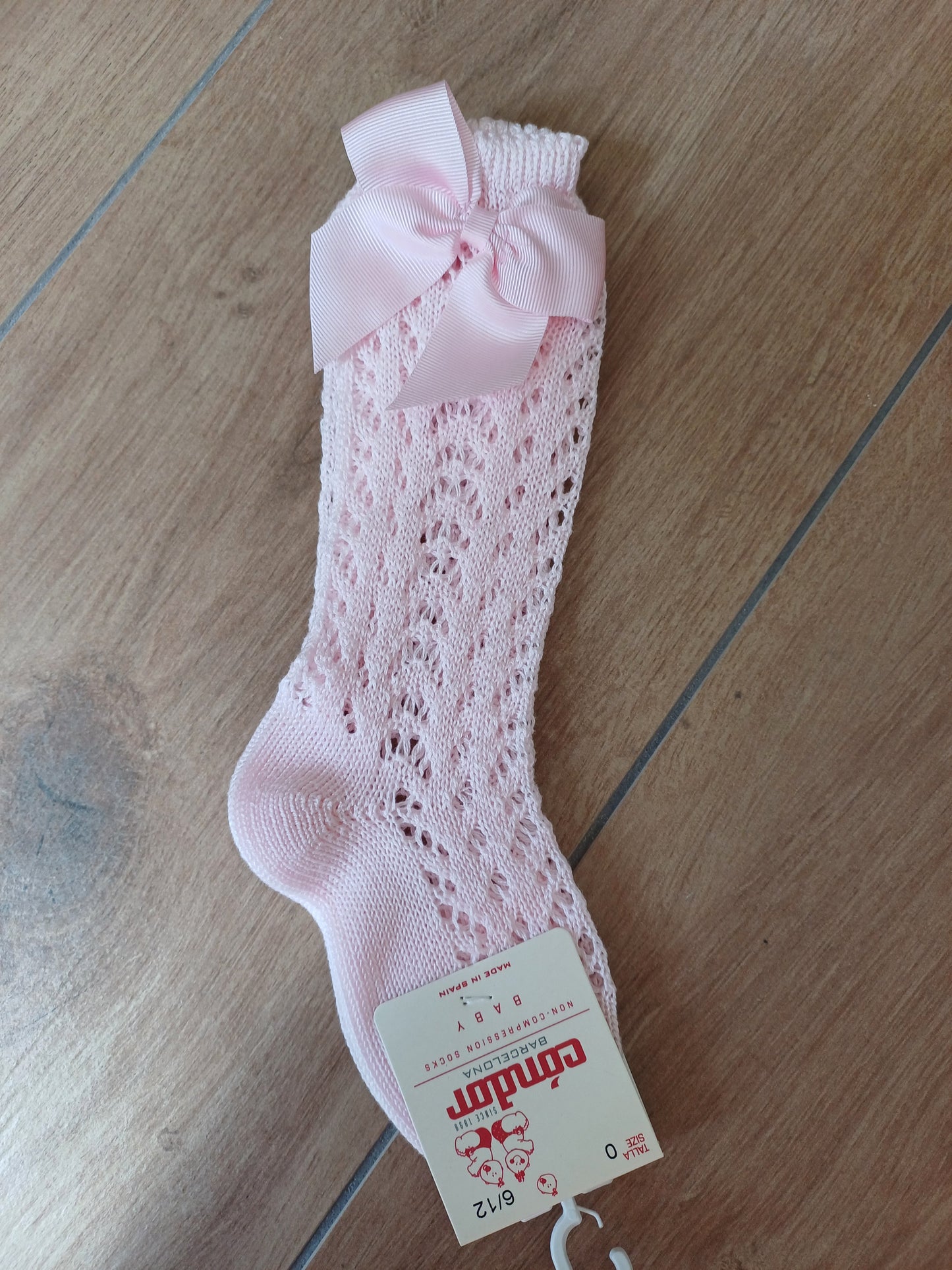 calzino con fiocco traforato