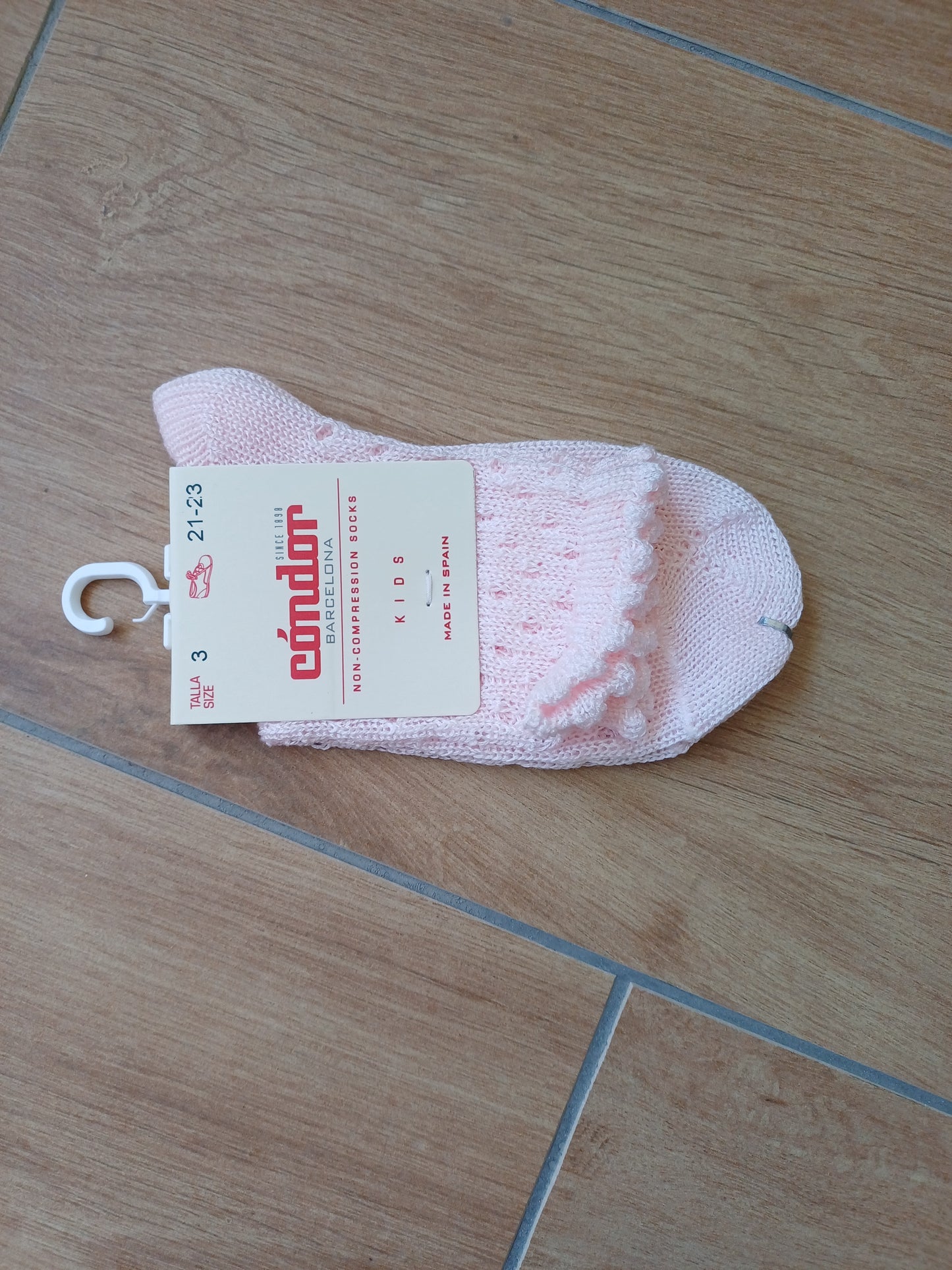 calzino con traforo puntinato