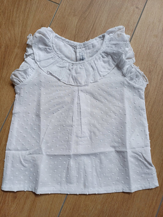 Camicia in plumetis giro maniche
