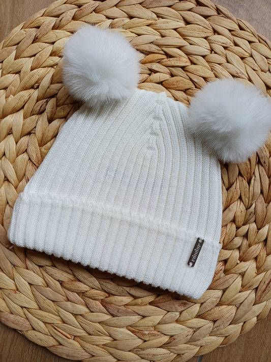 Cappellino con pon pon
